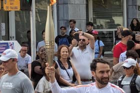 Olympic torch passes through Rue de Falkirk in Creteil as it heads to Paris. Pic: Contributed