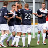 Phil Roberts celebrating scoring for Falkirk against Clyde in the Scottish League Cup in August 2013 (Pic: Lisa McPhillips)