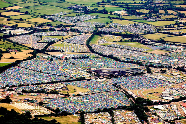Aerial view of the Glastonbury Festival site in Somerset, England, June 23, 2022, where fans have descended for the first time in three years.  See SWNS story SWBRglasto.   More than 200,000 festival-goers will arrive at Worthy Farm in Somerset for the event, headlined by Billie Eilish, Sir Paul McCartney and Kendrick Lamar.  