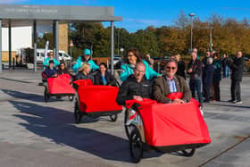 Christine Bell (CWAS CEO) pilots the leading Trishaw in new Forth Valley Royal Hospital Chapter’s inaugural ride with Ross McGuffie (CEO FVRH) and Gary Bouse, MSP, as passengers. (Pic. Scot Louden.)