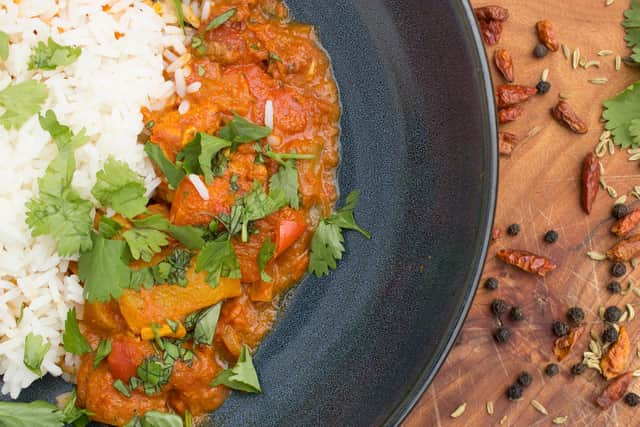 Word soon spread quickly Emily's tasty, home-cooked meals, such as chicken tikka masala