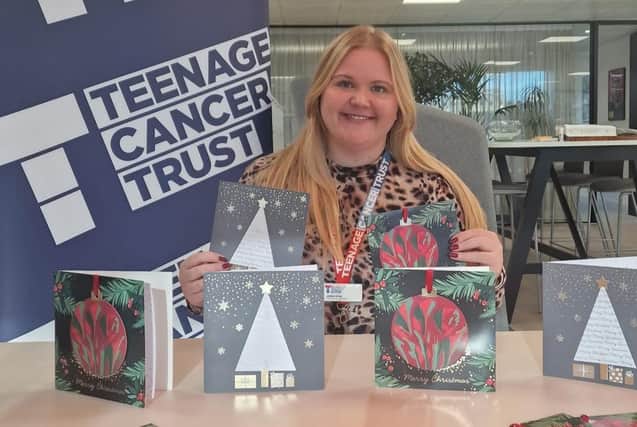 Jemma Syms, from the Teenage Cancer Trust, with Olivia Thom's winning Christmas card designs.  (Pic: Submitted)