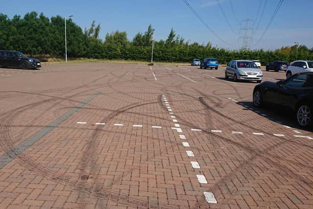 The monobloc in the car park has been damaged by cars 'doing donuts' and driving at excessive speeds