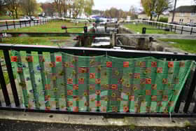 People gathered at the Camelon war memorial at Lock 16 to remember those who had given their lives for their country