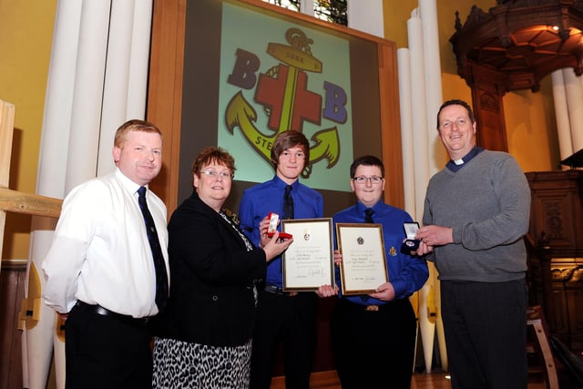 4th Falkirk Boys Brigade presentation in 2012 with Greg Neary gaining the highest award, the Queen's badge and Craig Maxwell the President's badge. Also pictured are captain Stuart Frampton, past captain Morag McKay and Rev Robert Allan.