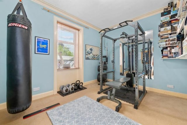 The large downstairs bedroom is currently being used as a home gym but it offers great flexibility.