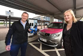 Michael Matheson MSP, cabinet secretary for Transport, Infrastructure and Connectivity and Cecil Meiklejohn, leader of Falkirk Council, at the official opening of the EV hub at the Falkirk Stadium.