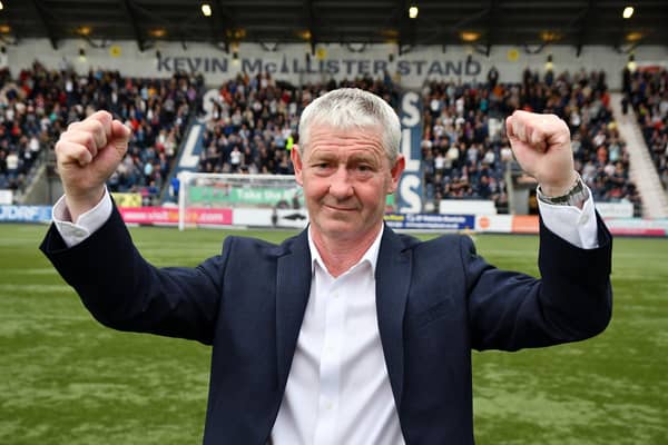 Kevin McAllister in front of the newly-named South Stand before the match started (Photos: Michael Gillen)