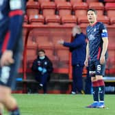 Falkirk captain Gary Miller looks devastated at the end of the game