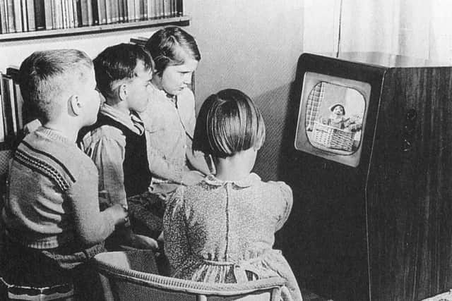 Kids watching TV.