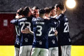 HAMILTON, SCOTLAND - OCTOBER 18: Falkirk’s Brad Spencer celebrates with teammates after his side go 1-0 ahead during a William Hill Championship match between Hamilton Academical and Falkirk at the ZLX Stadium, on October 18, 2024, in Hamilton, Scotland. (Photo by Ross MacDonald / SNS Group)