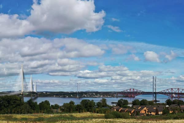 Photo taken from the site of the planned new CALA homes, showing the Queensferry Crossing as well as the Forth Rail and Road bridges.