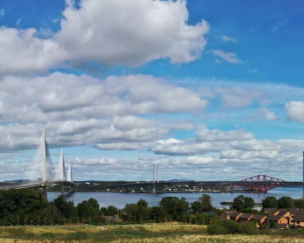 Photo taken from the site of the planned new CALA homes, showing the Queensferry Crossing as well as the Forth Rail and Road bridges.
