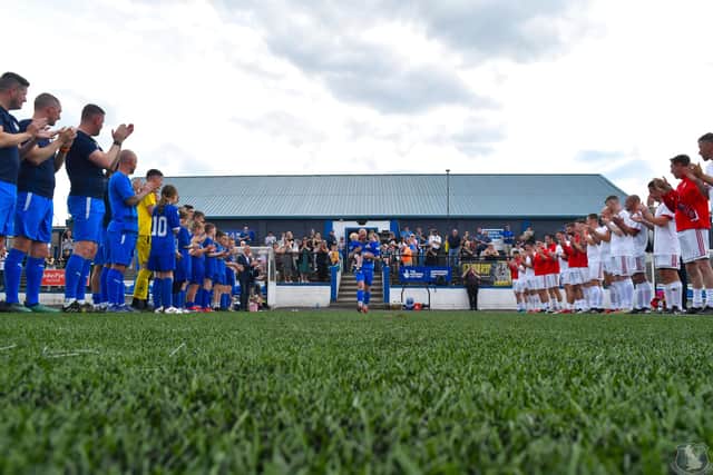 Bo’ness United legend Michael Gemmell walks out onto the pitch with family ahead of his testimonial match against former club Hill of Beath Hawthorn (Photo: Turnstiles and Terraces)