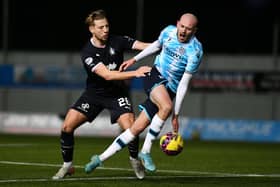 Sean Mackie in acton against Dundee striker Zak Rudden