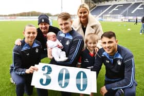 The 300th Junior Bairn member this year joined some of the team. Pictured Aidan Nesbitt; grandfather Derek Steel; four week Chet Strathie; Coll Donaldson; mum Ellie Strathie; brother Chase Strathie; and Ryan Shanley.