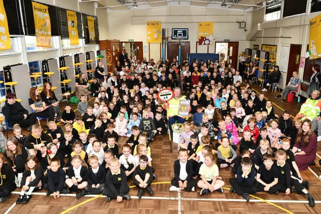 Kinneil Primary School say farewell to lollipop lady and cleaner Catherine Burton as she retires. Pic: Michael Gillen