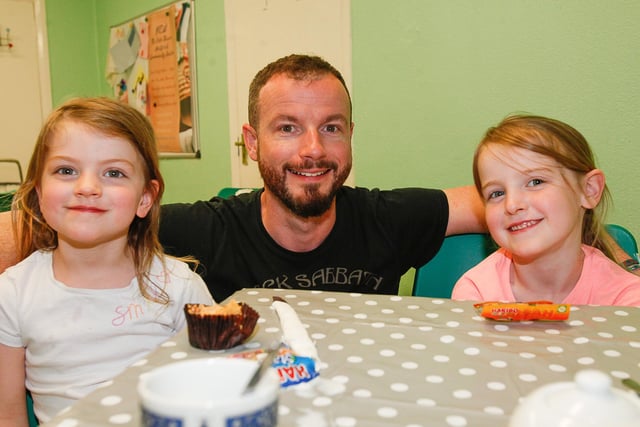 Harry Duthie with his daughters Eve, four, and Fearne, six, enjoying the fun day