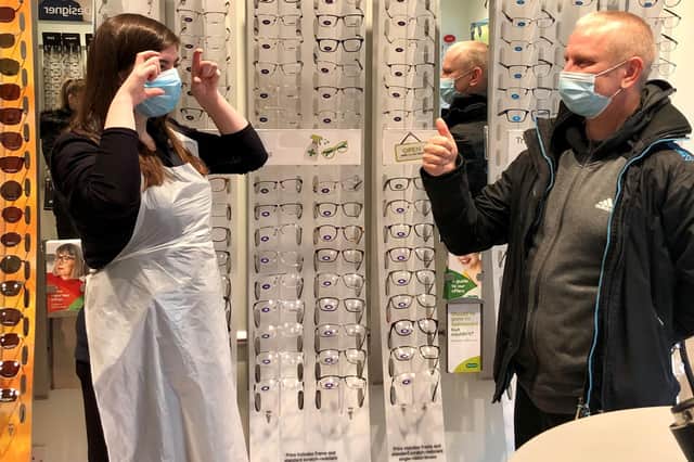Specsavers Linlithgow's Kaitlin Nelson and patient Steven Balloch.