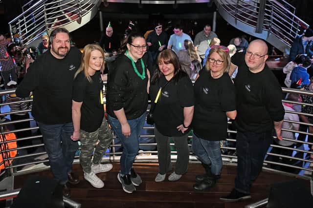 The Awakening team members, including Maureen Kilgour (third from right), pictured pre-coronavirus lockdown. Picture: Michael Gillen.