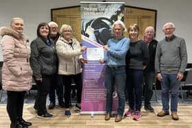 Some of the The Driving Force volunteers with the certificate from Volunteer Scotland. Pic: Contributed