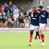 Alfredo Agyeman celebrates with teammate Liam Henderson after making it 1-0 to Falkirk against Edinburgh City (Photo: Michael Gillen)