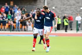 Alfredo Agyeman celebrates with teammate Liam Henderson after making it 1-0 to Falkirk against Edinburgh City (Photo: Michael Gillen)