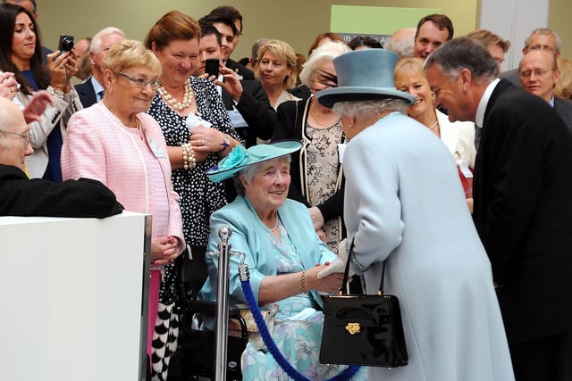 Lily Burns meets Her Majesty the Queen at the opening.