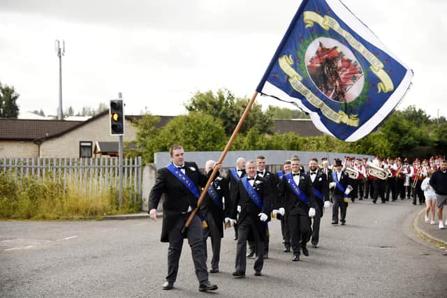 The Free Colliers marching through the Braes villages. Pic: Alan Murray