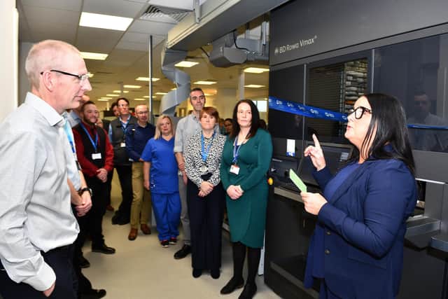 NHS Forth Valley CEO Ross McGuffie and Laura Byrne, director of pharmacy, join colleagues to officially open the new biometric safe facility at Forth Valley Royal Hospital last November. Pic: Michael Gillen