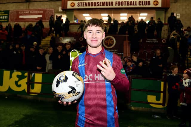 07-12-2024. Picture Michael Gillen. STENHOUSEMUIR. Ochilview Park. Stenhousemuir FC v Dumbarton FC. Season 2024 - 2025. Matchday 16. SPFL William Hill League One. Hattrick scoring, Matt Yates 10 with the match ball at the end of the game.