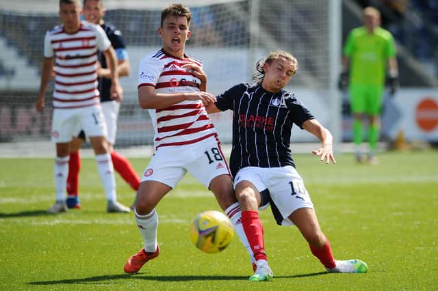 Falkirk goalscorer Aidan Nesbitt in a tussle with Hamilton's Reegan Mimnaugh (picture by Michael Gillen)