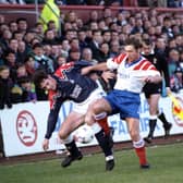 Falkirk's David Weir and Rangers' Ally McCoist go fo the ball in a Falkirk v Rangers football match at Brockville, December 1992. Final score 1-2 to Rangers.