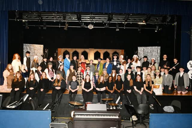 The talented cast take a break from rehearsals for Grangemouth High School's production of Oliver the Musical (Picture: Michael Gillen, National World)