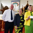 1st Camelon Boys' Brigade donate £1500 to Falkirk Foodbank. Pictured, left to right: Peter Marshall, company lieutenant; Janice Guthrie, Camelon Parish Church; Janice Arbuckle, company captain; and Alastair Blackstock, Falkirk Food Bank chairman. Pic: Michael Gillen