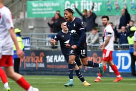 Rumarn Burrell celebrates scoring late equaliser for Falkirk against Airdrieonians (Pic Michael Gillen)