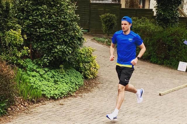 Ruaridh Miller completed a marathon on his driveway in support of Strathcarron Hospice.