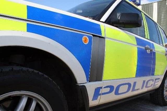 Police say a 28-year-old female driver was taken to hospital.