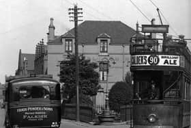 Tram No 6 and Pender's bus at the Plough Hotel, Stenhousemuir.  (pic: submitted)