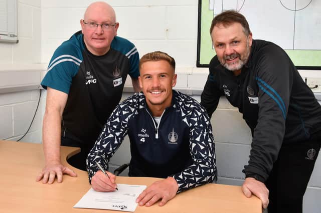 Tom Lang signs new deal with Falkirk until June 2027 in the company of manager John McGlynn and his assistant Paul Smith (Pics by Michael Gillen)