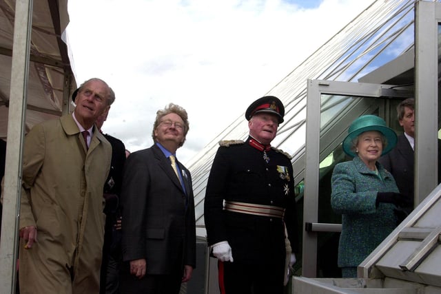 Queen Elizabeth II and Prince Philip attend the official opening of the Falkirk Wheel.