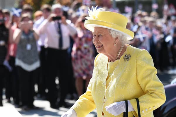 Schools in Scotland are expected to be closed during a public holiday on the day of the Queen's funeral. Pictured is the Queen on a visit to Greenfaulds High School in Cumbernauld (Photo: John Devlin).