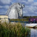 Scottish Canals activities assistant Rebecca Brown provides instruction to people hiring the electric boats. Pic: Lisa Ferguson