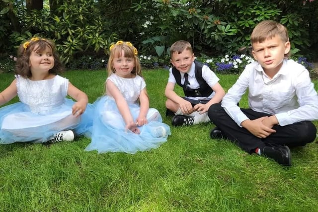 Ciaran's mum, Yvonne, made the flower girl dresses from Kyrsten's mom's wedding dress. A flower girl and pageboy each from Scotland and Canada.