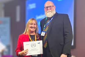 Lesley Pickles receives her Recognition Award from Business Gateway chief officer Hugh Lightbody (Picture: Submitted)