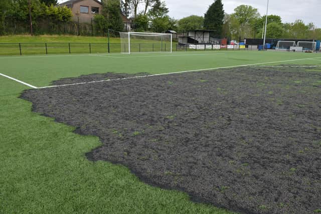 It is understood the artificial surface had been smouldering for several hours before the fire was discovered