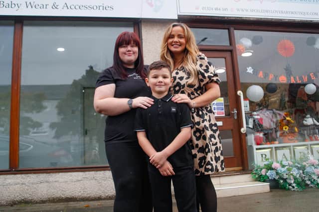 Gayle Stuart (R) of Spoiled By Love Baby Boutique,  pictured with her son Myles and her colleague Sheree