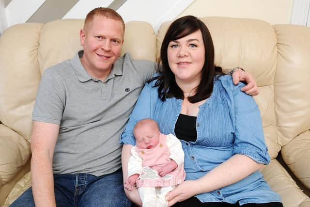 New parents Steven Buchanan and Samantha Darrien with baby daughter Eva Buchanan who was born at 12.24pm on New Year's Day and weighed 6lb 7oz