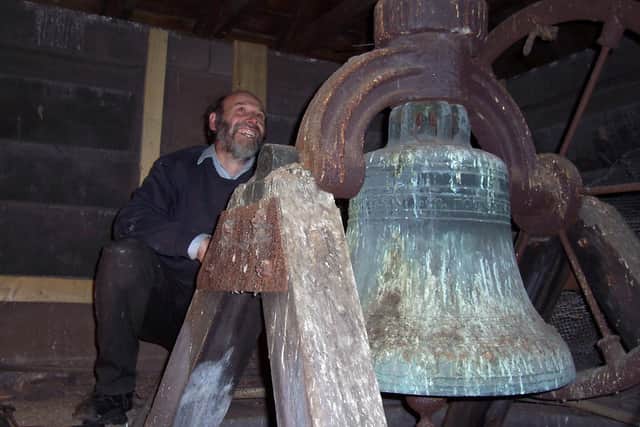 Geoff Bailey with the Town Mission bell.