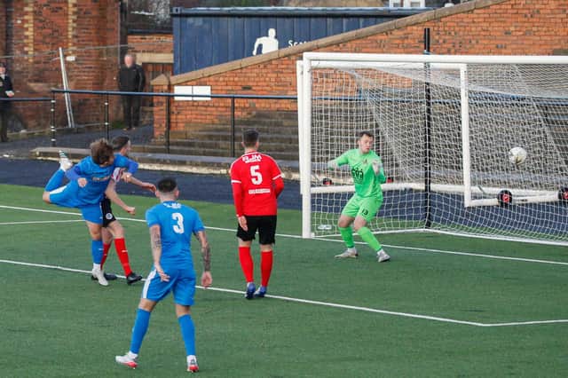 Matty Flynn scores to put Bo'ness United 1-0 up against Cumbernauld Colts (Pic by Scott Louden)